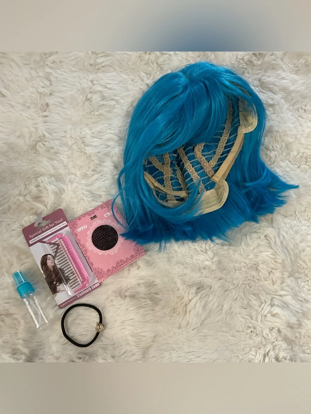 NWT vibrant blue cosplay wig, shoulder length with bangs, includes extras in pic